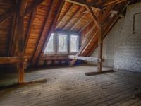 Empty attic of a house with no insulation