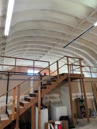 Spray foam on a curved ceiling