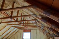 Attic with spray foam insulation on the walls and ceiling