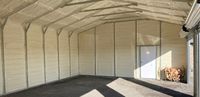 Spray foam insulation on the walls of a pole barn